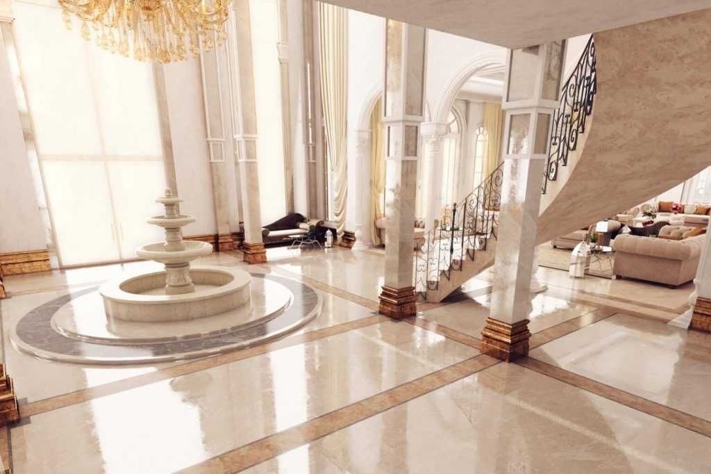3D interior render of a villa grand hall with a fountain and curved staircase