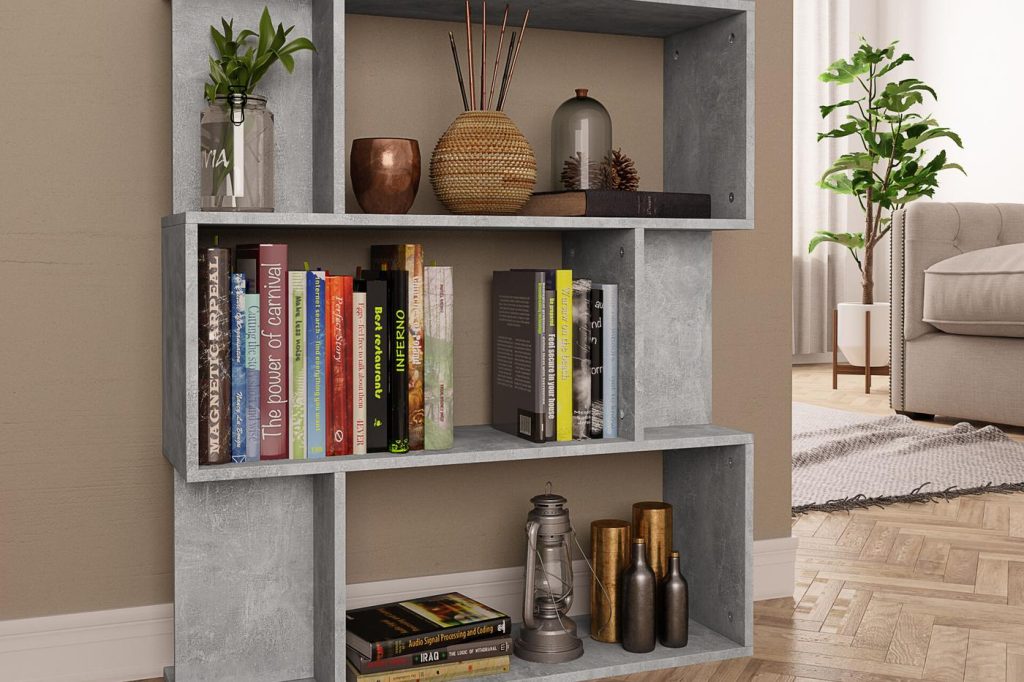 3D lifestyle render of a concrete-grey room divider bookcase